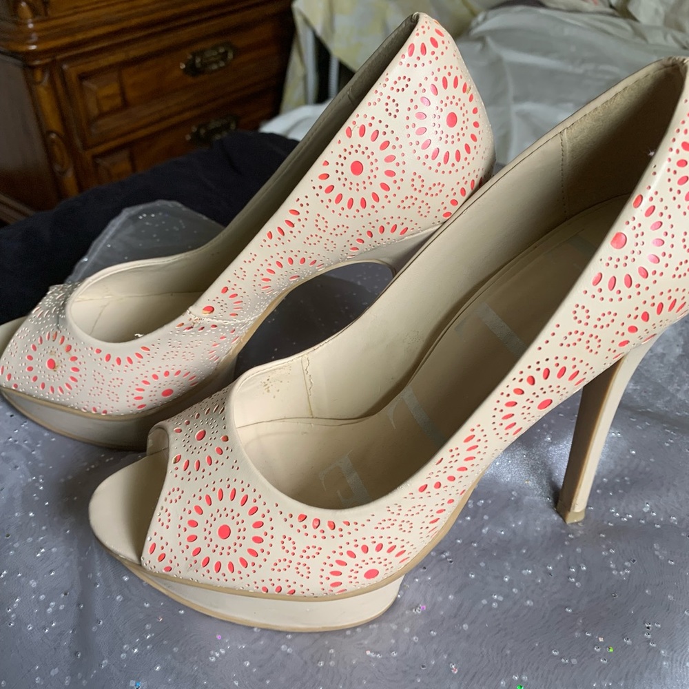 Tan heels with peach decorations